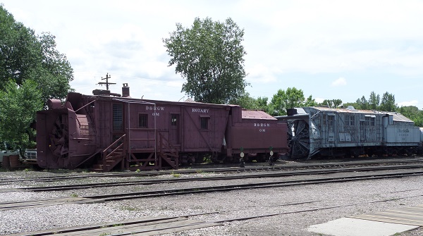 Rotary snow plows